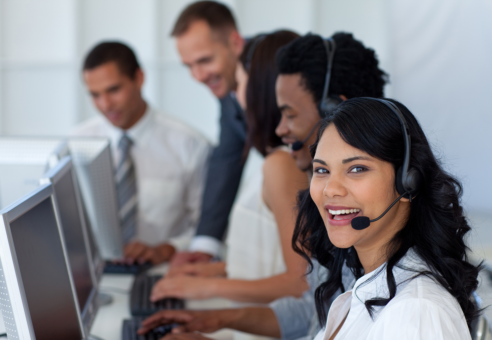 Customer service team working with headsets