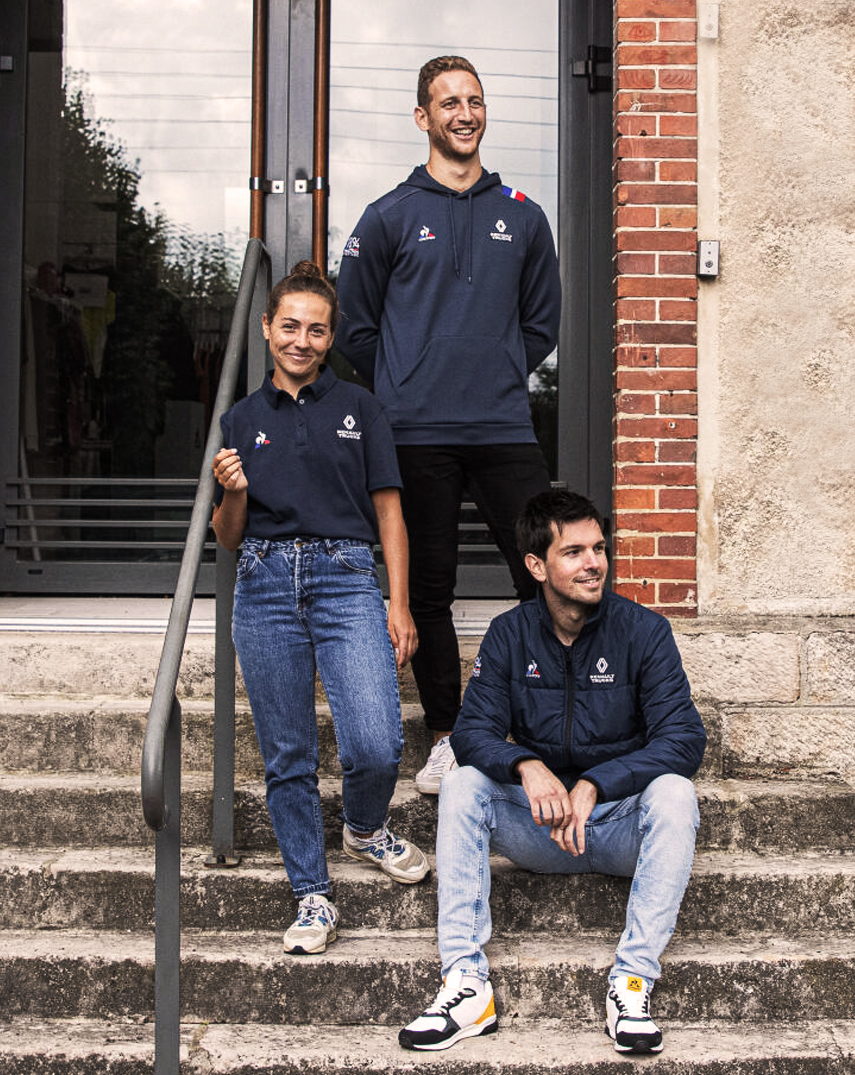 Group of people wearing Renault Trucks x Le Coq Sportif clothing